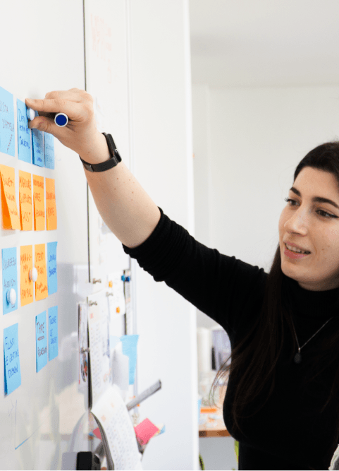 Person indicating the blackboard